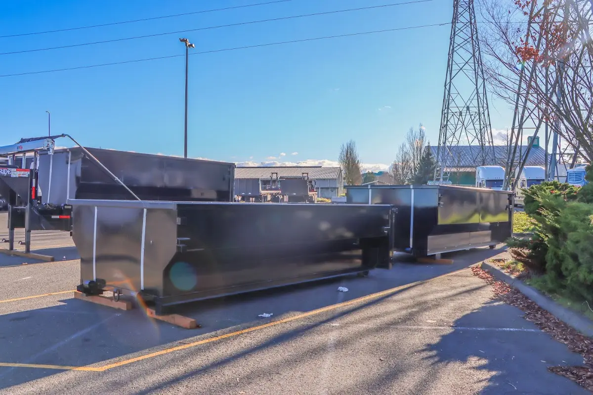 Roll-off dumpster ready for waste disposal at job site for Estate Cleanout Dumpster Rental in Webster